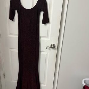 Long Red sparkling dress . Mid length arms.
